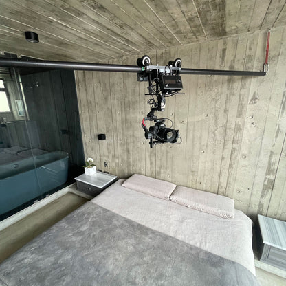 rigging a camera over a bed